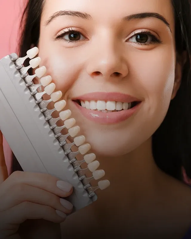 Woman At Dentist For Teeth Whitening