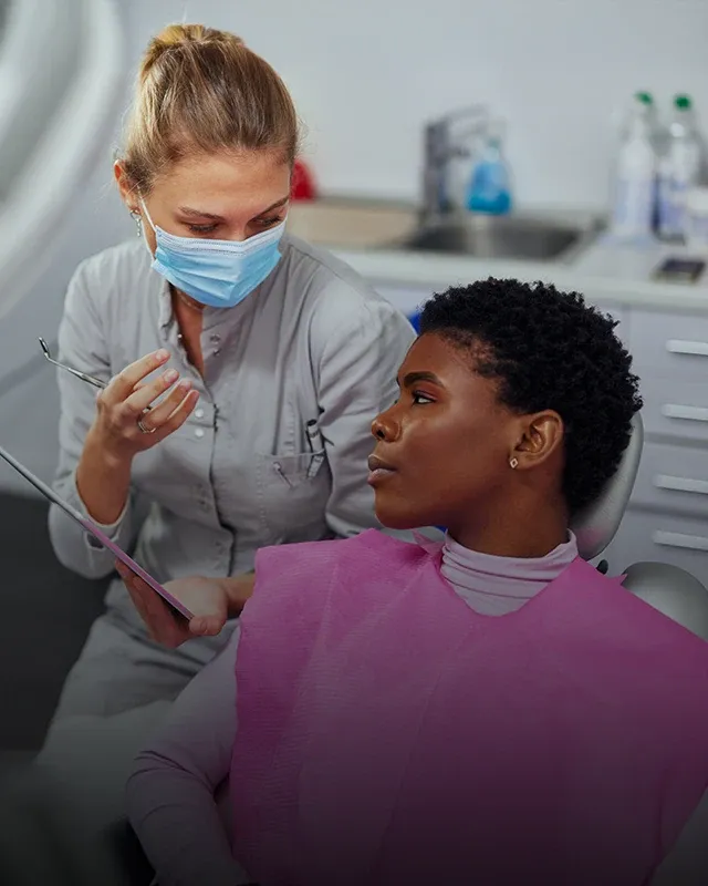 Woman In Office For A Dental Exam